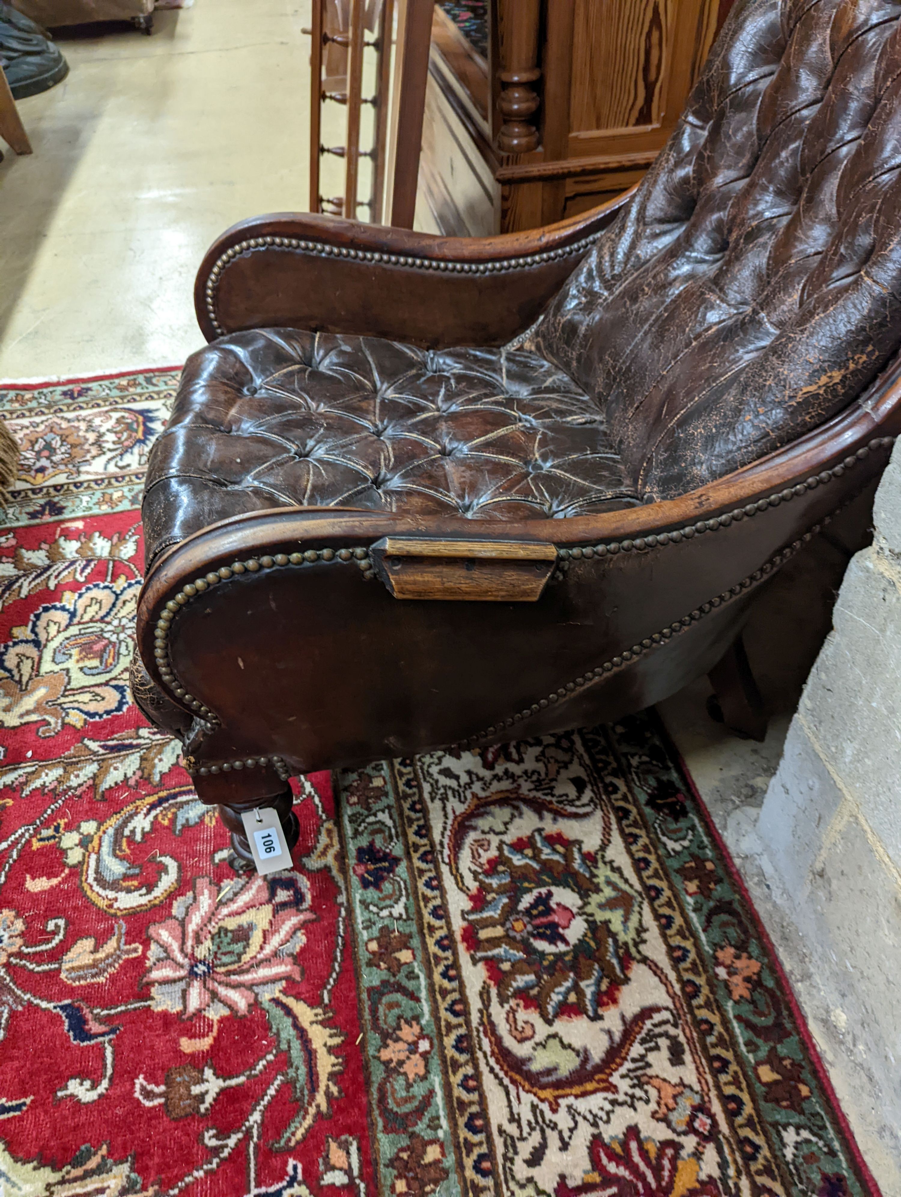 A late 19th century leather button back chair. H-90cm.
